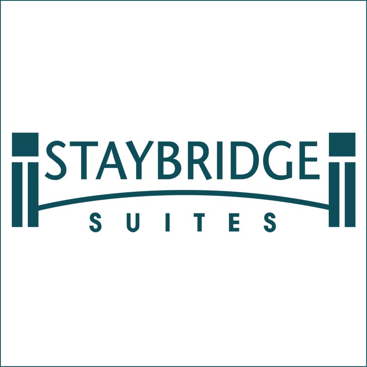 A logo of staybridge suites