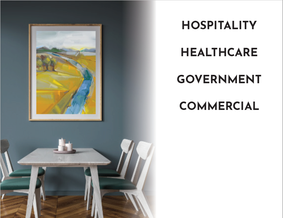 A table with chairs and a painting on the wall.